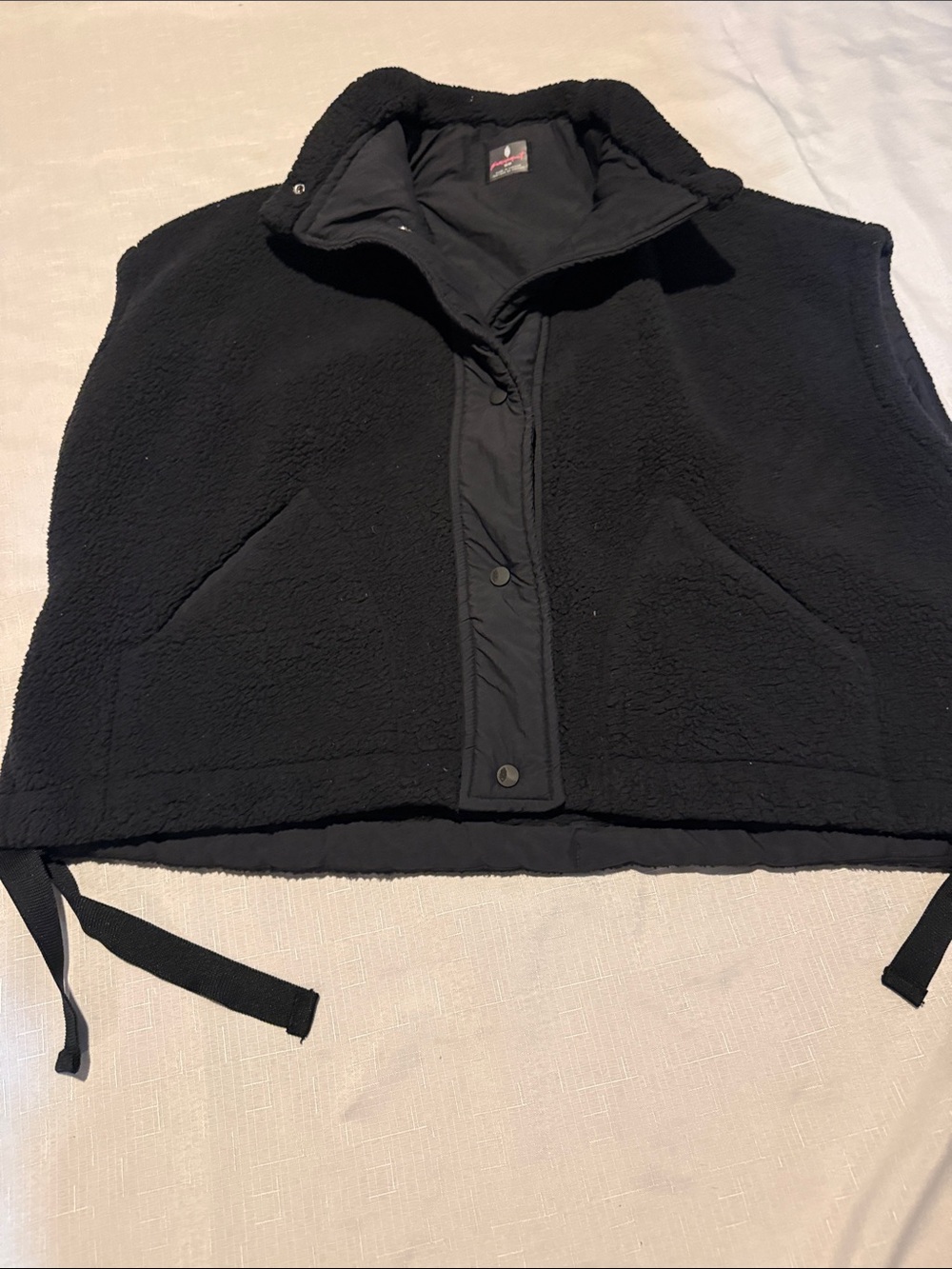 FP Movement by Free People Black Fleece Snap-Front Vest with Drawcord Ties